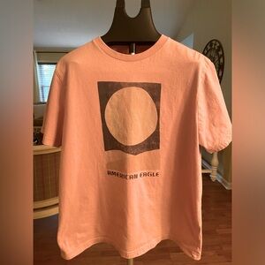 American Eagle tee.